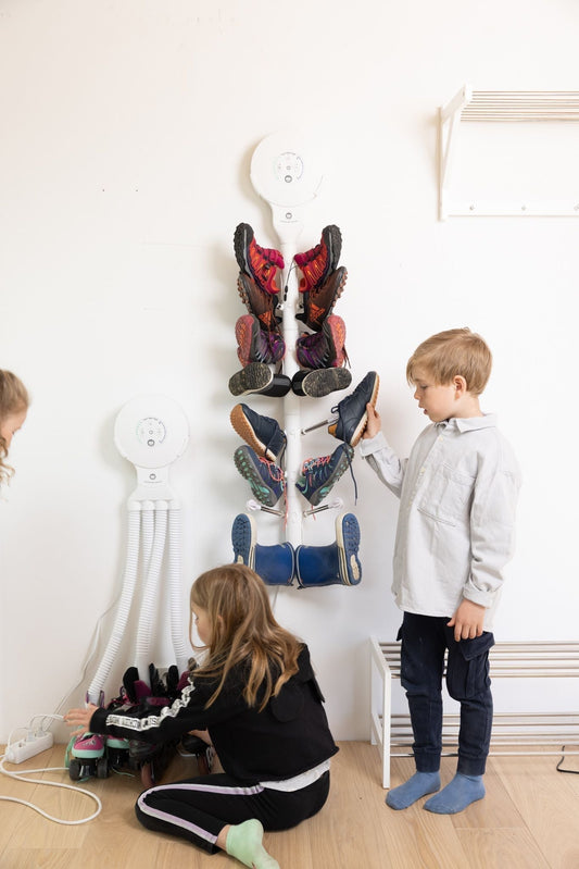 Hedgehog Dryer keeping boots and gloves dry in a family mudroom during spring cleaning